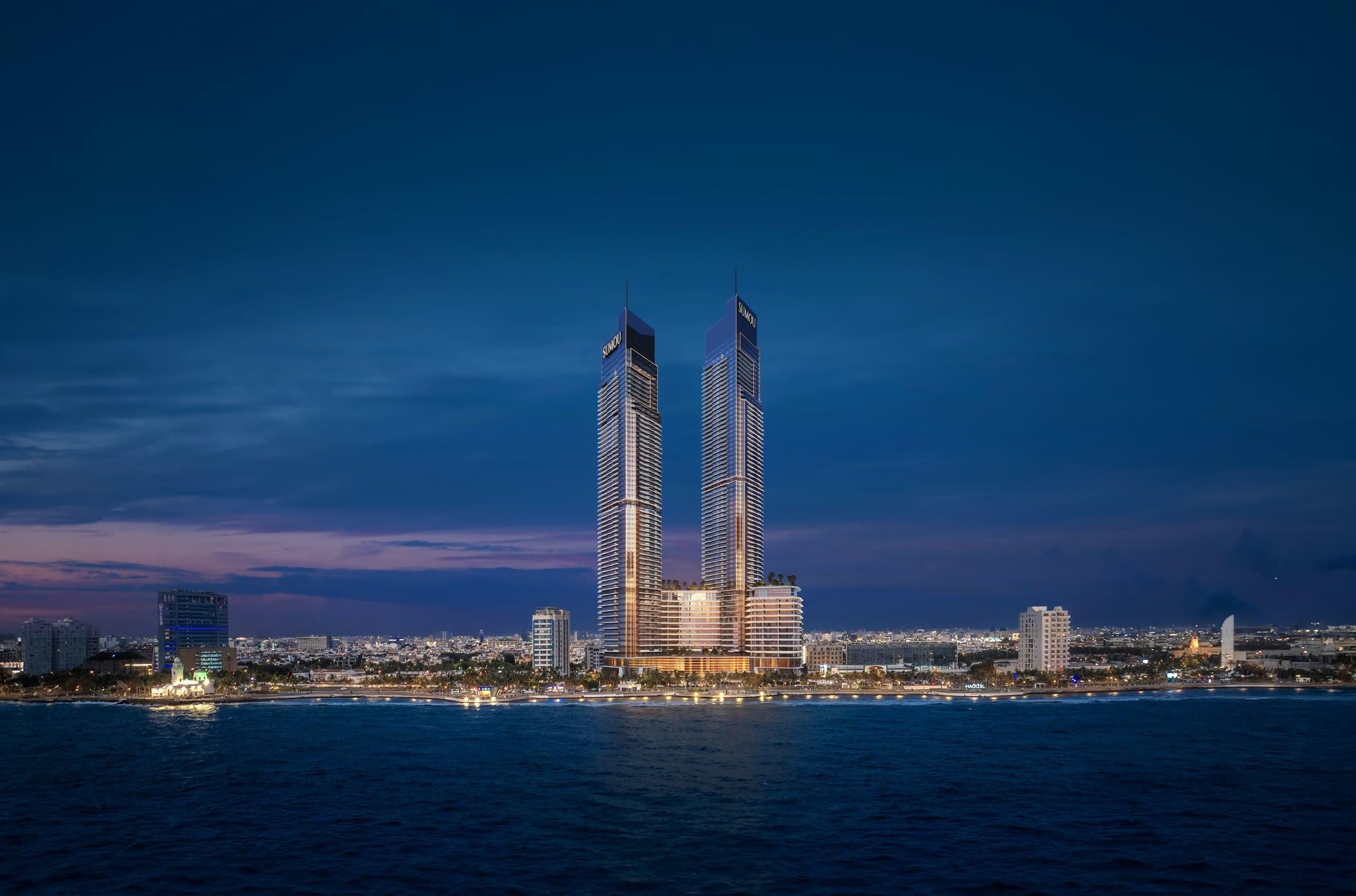 Sumou Towers — twin towers on the Jeddah Corniche at dusk